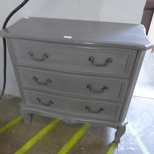 1516 - A grey three drawer chest of drawers