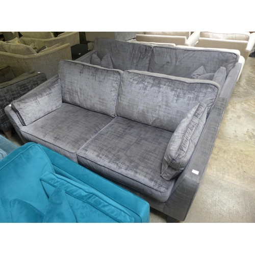 1463 - A pair of Barker And Stonehouse magnesium upholstered four and three seater sofas (both have had som... 