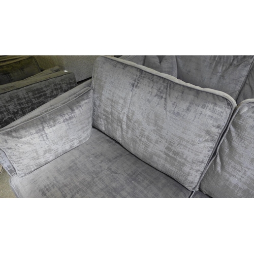 1463 - A pair of Barker And Stonehouse magnesium upholstered four and three seater sofas (both have had som... 