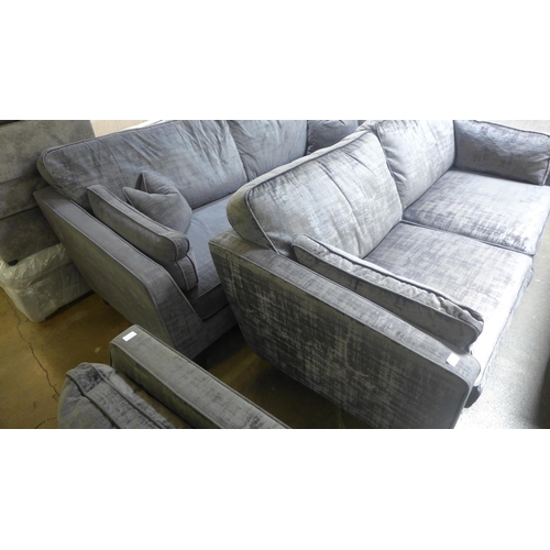 1463 - A pair of Barker And Stonehouse magnesium upholstered four and three seater sofas (both have had som... 