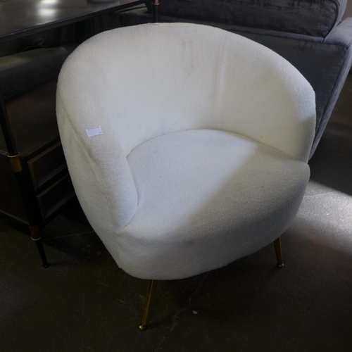 1478 - A sheepskin effect upholstered chair with gold legs