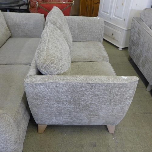 1572 - Oatmeal upholstered three and two seater sofas - worn