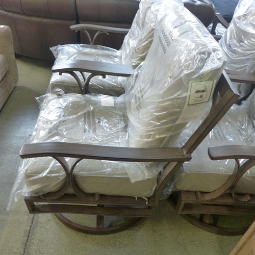 1584 - A set of six swivel garden chairs  *This lot is subject to VAT