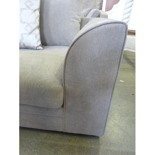 1586 - A small light grey two seater sofa with patterned scatter cushion