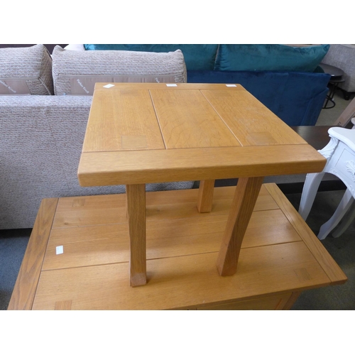 1594 - An oak two drawer coffee table and matching lamp table