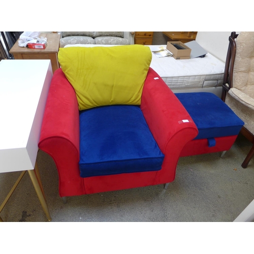 1612 - A red, blue and yellow upholstered armchair and ottoman footstool