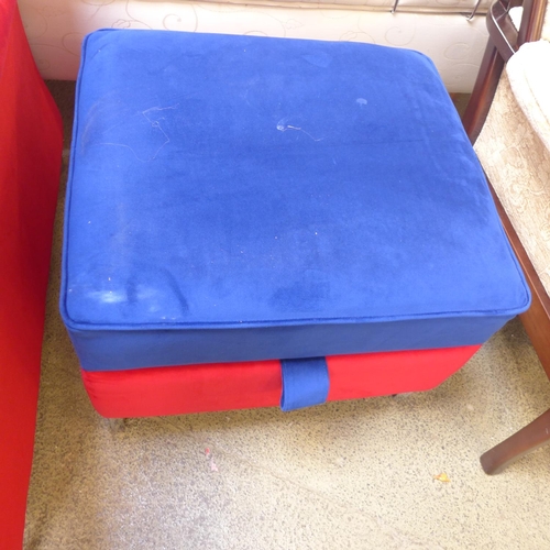 1612 - A red, blue and yellow upholstered armchair and ottoman footstool