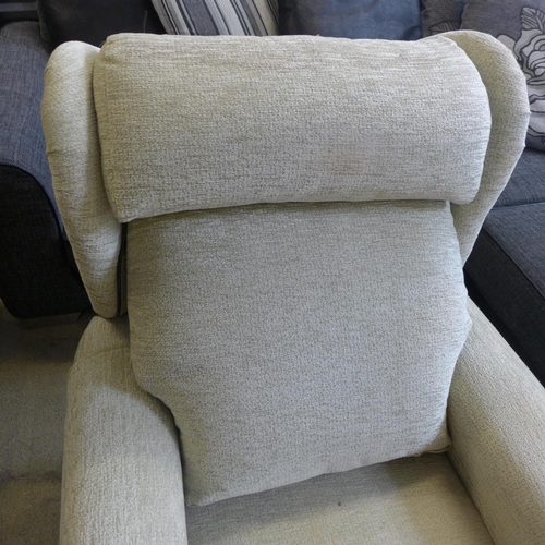 1618 - An olive green rise and recline armchair