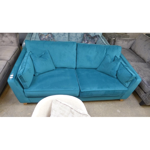 1456 - A Barker and Stonehouse teal velvet three seater sofa