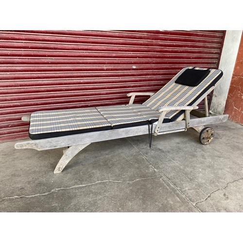 312 - A teak sun lounger