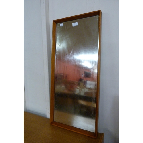 14 - A teak framed mirror