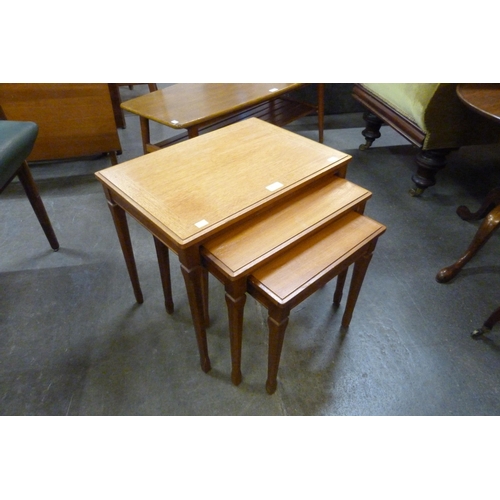 76 - A teak nest of tables