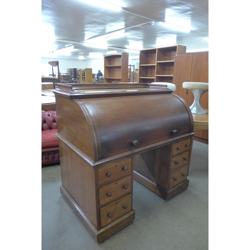 118 - A Victorian mahogany cylinder roll top desk