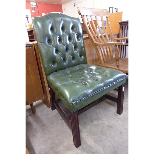 120 - A Regency style mahogany and green leather library chair