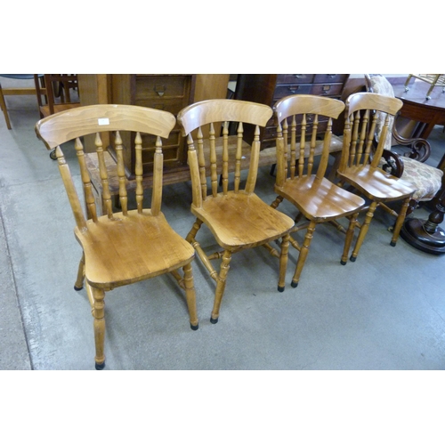 152 - A set of four Victorian style beech kitchen chairs