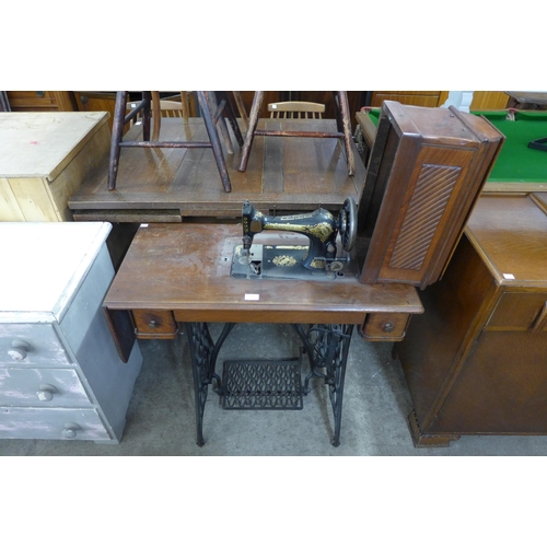 220 - A Singer treadle sewing machine