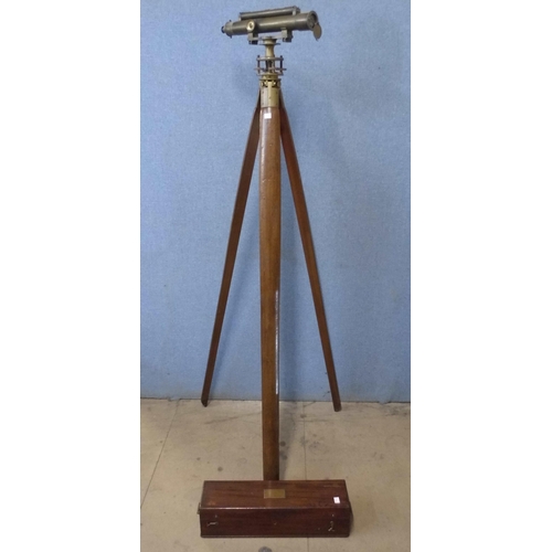 293 - A Charles Baker surveyor's brass theodolite/level with case and mahogany tripod stand