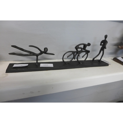 1317 - A metal Triathlon sculpture W34cm (961815)