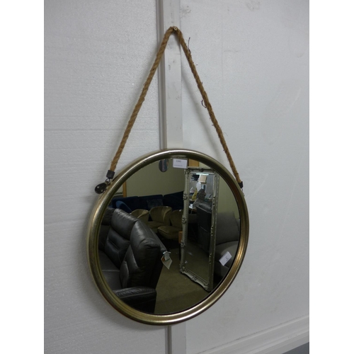 1343 - A medium round champagne colour metal mirror on a hanging rope H46cm (JRG1509)