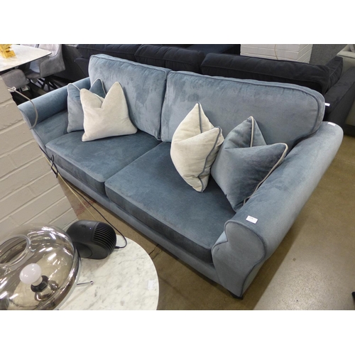 1378 - A diamond blue upholstered four seater sofa