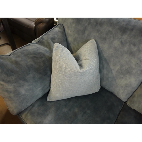 1392 - A teal shark skin upholstered two seater sofa