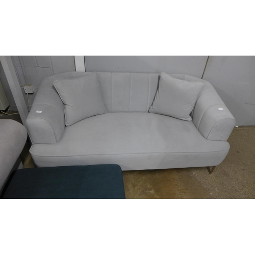 1422 - A grey velvet upholstered shell back two seater sofa