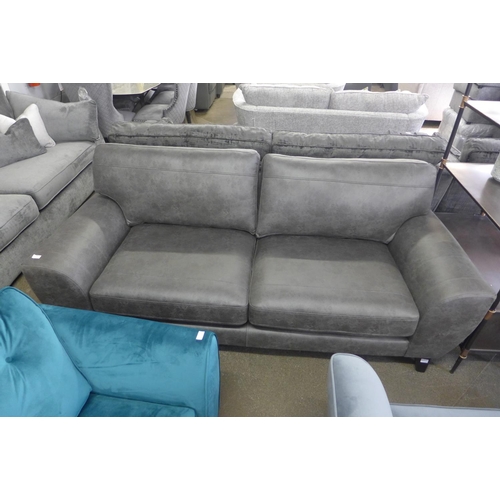 1466 - A grey vegan leather upholstered three seater sofa