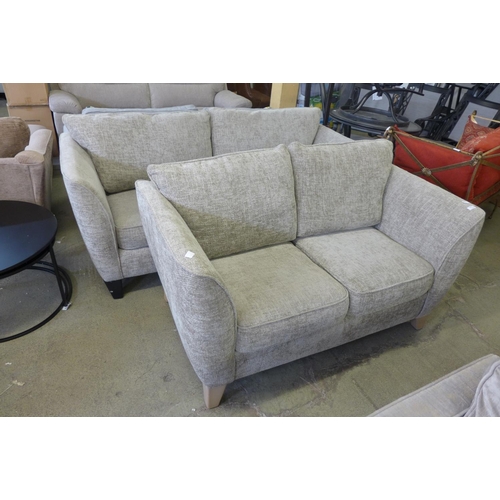 1572 - Oatmeal upholstered three and two seater sofas - worn