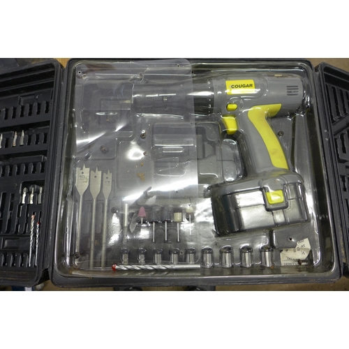 2020 - 2 Black & Decker power drills CD12C & a Cougar power drill with case of accessories (incomplete)