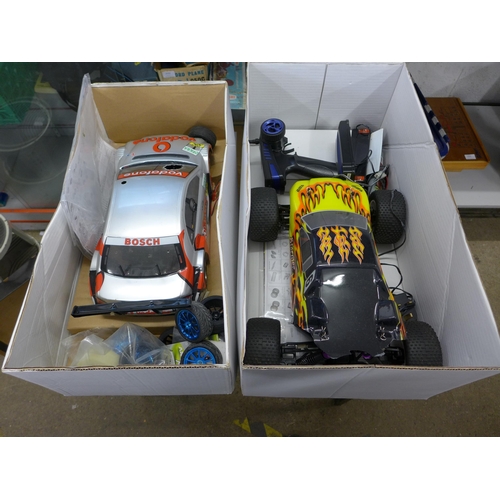 2088 - Two boxed petrol driven motor cars, controllers, fuel, kits, etc.