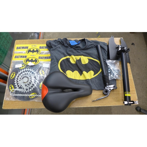 2111 - Two 1989 Batman bicycle wheel hub caps, Batman T-shirt size XXL, bike seat post & cushioned bike sea... 