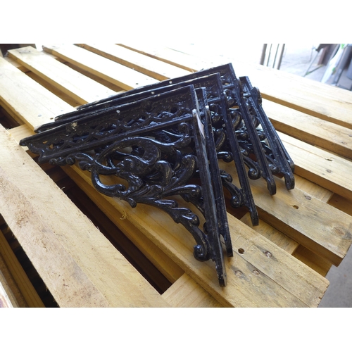 2205 - Six ornate black painted metal shelf brackets