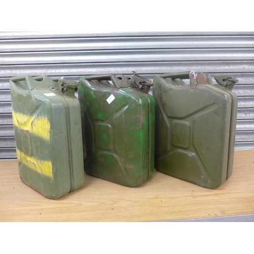 2302 - Three vintage green metal 20 litre jerry cans