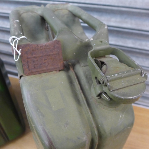 2302 - Three vintage green metal 20 litre jerry cans