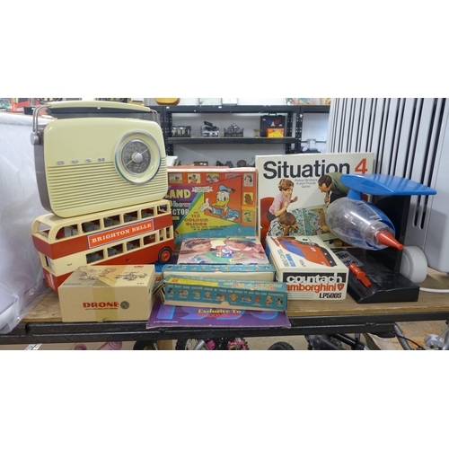 2313 - Box of vintage toys inc. Bush radio, Situation, fishing game, etc.