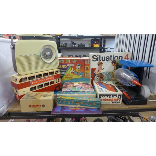 2313 - Box of vintage toys inc. Bush radio, Situation, fishing game, etc.