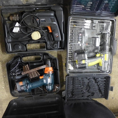 2020 - 2 Black & Decker power drills CD12C & a Cougar power drill with case of accessories (incomplete)