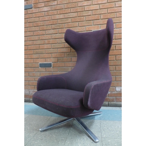 1 - A Vitra Grand Repos chrome and aubergine fabric upholstered revolving lounge chair, designed by Anto... 