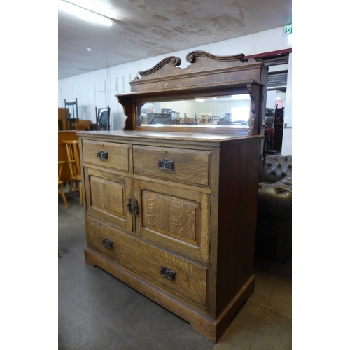 103 - A Victorian oak mirrorback side cabinet