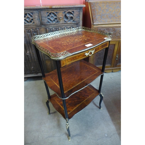 107 - A 19th Century French marquetry inlaid rosewood, amboyna and ebonised three tier etagere