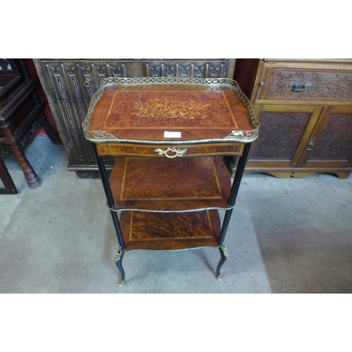 107 - A 19th Century French marquetry inlaid rosewood, amboyna and ebonised three tier etagere