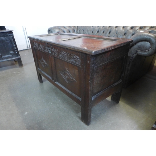 109 - A Charles II carved oak coffer