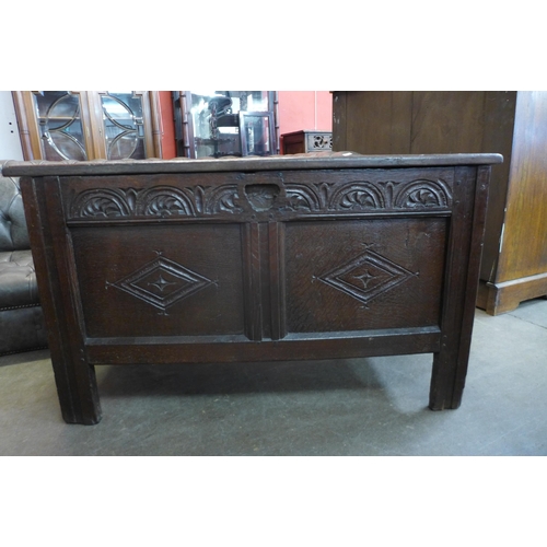 109 - A Charles II carved oak coffer