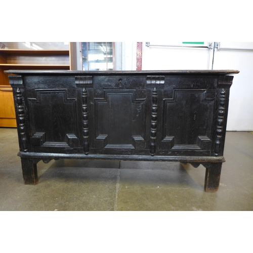 110 - A Charles II carved oak coffer