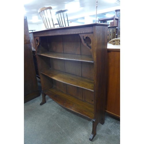 115 - An Arts and Crafts oak open bookcase