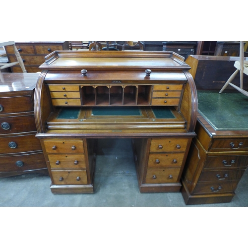 118 - A Victorian mahogany cylinder roll top desk