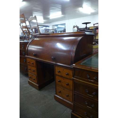 118 - A Victorian mahogany cylinder roll top desk