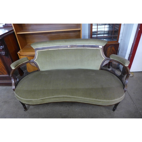 121 - An Edward VII inlaid mahogany and green fabric upholstered salon settee