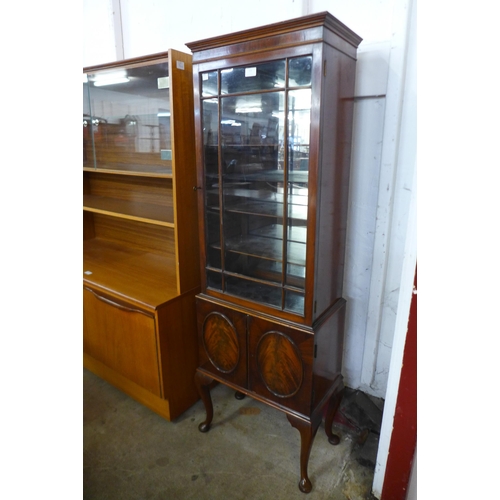 122 - A Queen Anne style mahogany display cabinet