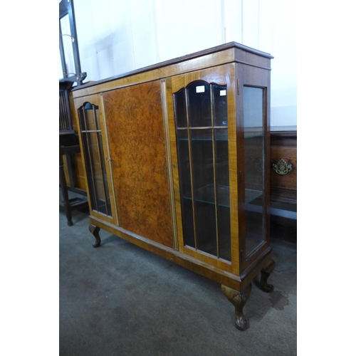 127 - A burr walnut display cabinet